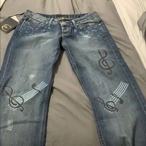Just Cavalli music themed blue jeans boot cut.